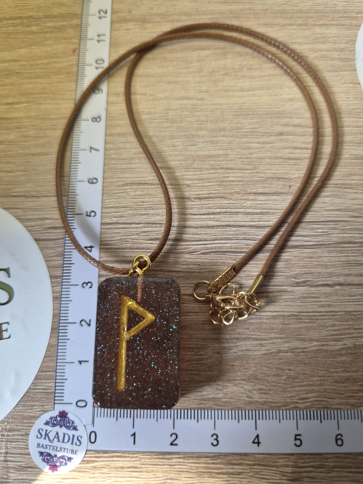 Runenanhänger Wunjo in braun oder schwarz