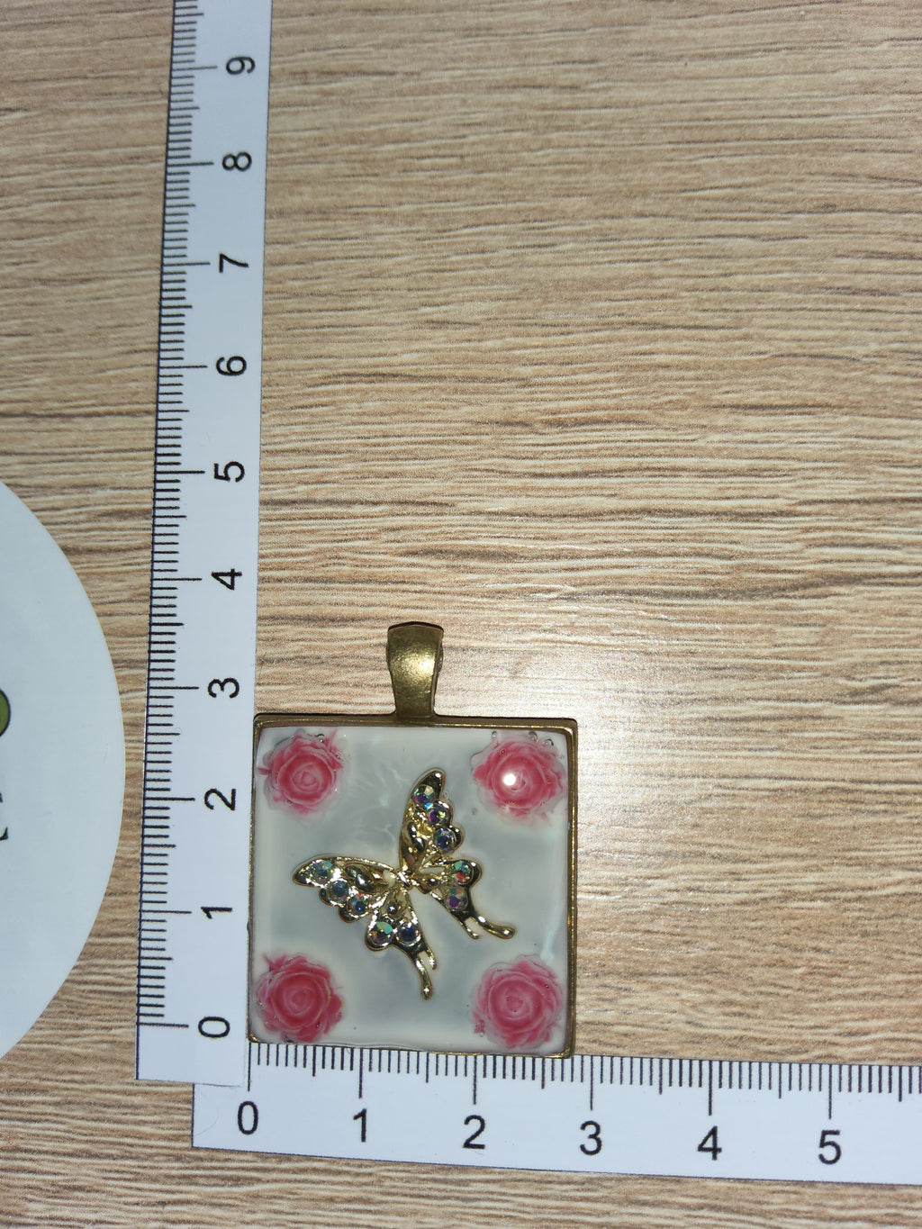 Kette mit Amulett Blüte Schmetterling