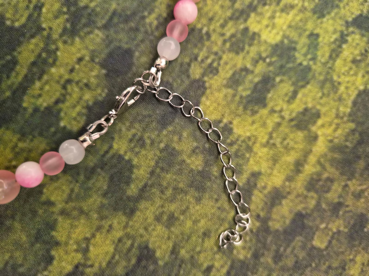 Perlenkette mit Glasanhänger in rosa