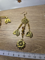 Goldige Ohrringe mit Sonnenblumen